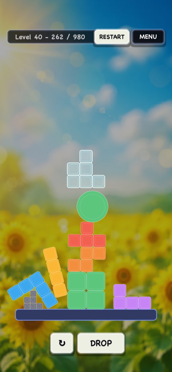 Shape Stackers screenshot showing a tall tower approaching the goal line