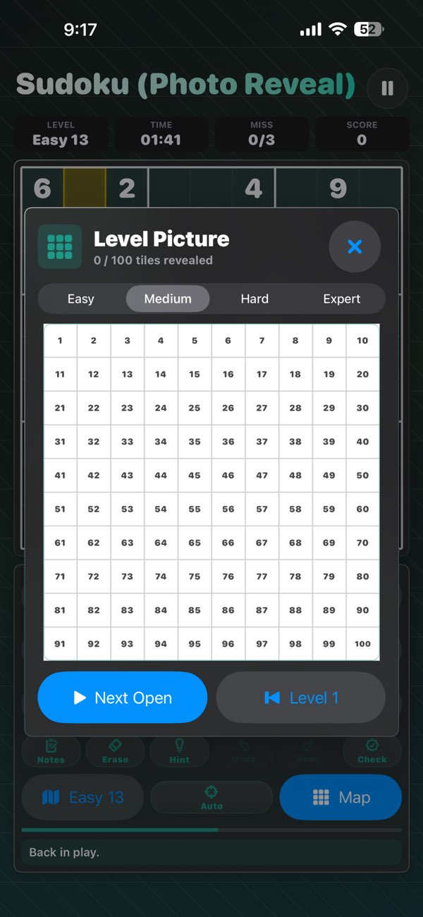 Sudoku Photo Reveal gameplay screenshot showing the puzzle board and photo reveal area